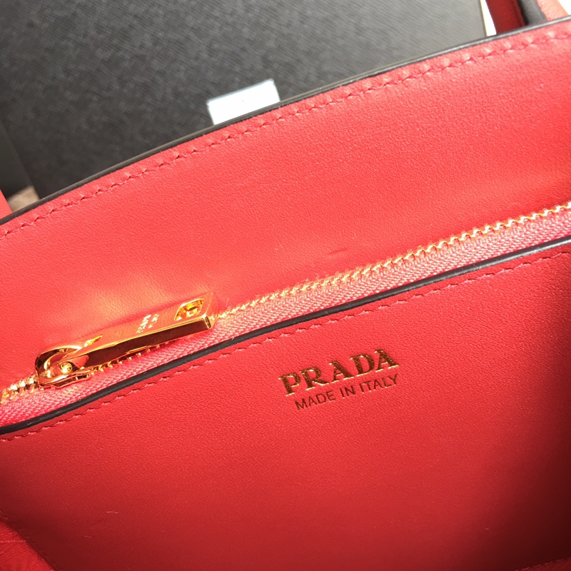 Pra*a top handle bags